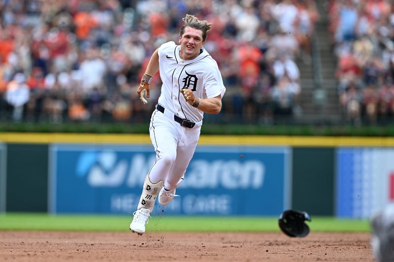 Tigers left fielder Brett Callahan runs to third base for a two-run triple on the first pitch of his MLB debut against the White Sox in the second inning.