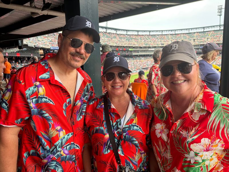 From left to right, Sam Orlando, Angie Orlando and Char Purdy are three out of 14 people who rode a bus together to Comerica Park for Sunday's Tigers game and "Magnum P.I." Day.