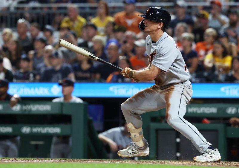 Detroit Tigers left fielder Brett Callahan (34) hits a two-run single against the Pittsburgh Pirates during the sixth inning at PNC Park in Pittsburgh on Monday, Aug. 17, 2026.