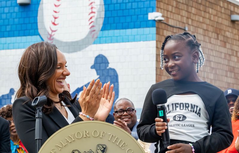 Detroit Mayor Mary Sheffield and a Detroit student at the Day One press conference.