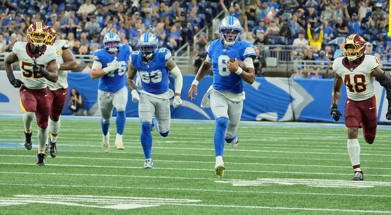Detroit Lions quarterback Josh Dobbs runs in for a touchdown in the first quarter against the Washington Commanders at Ford Field in Detroit on Saturday, August 22, 2026.