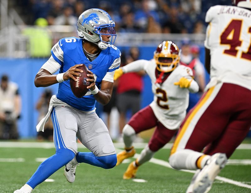 Josh Dobbs, left, is battling to earn a roster spot with the Lions as a backup quarterback.