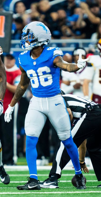 Detroit Lions wide receiver Cedrick Wilson Jr. (86) celebrates a first down during the first quarter of a preseason game against the Washington Commanders at Ford Field in Detroit on Saturday, Aug. 22, 2026.