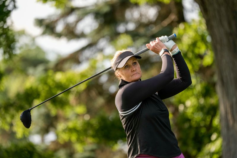 Maria McBride watches her tee shot at the second hole during the third round of the 2026 U.S. Senior Women's Open at Barton Hills Country Club in Ann Arbor on Saturday, Aug. 22, 2026.