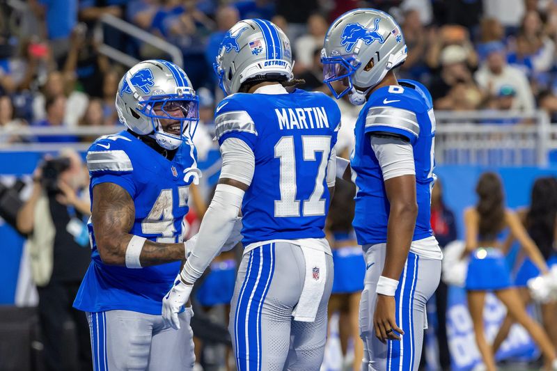 Aug 22, 2026; Detroit, Michigan, USA;  Detroit Lions running back Trayveon Williams (47) celebrates his touchdown against the Washington Commanders with wide receiver Tay Martin (17) quarterback Joshua Dobbs (6) in the second half at Ford Field.  Mandatory Credit: David Reginek-Imagn Images