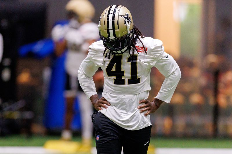 Aug 02, 2026; Metairie, LA, USA;  New Orleans Saints running back Alvin Kamara (41) looks on during training camp at Ochsner Sports Performance Center. Mandatory Credit: Stephen Lew-Imagn Images