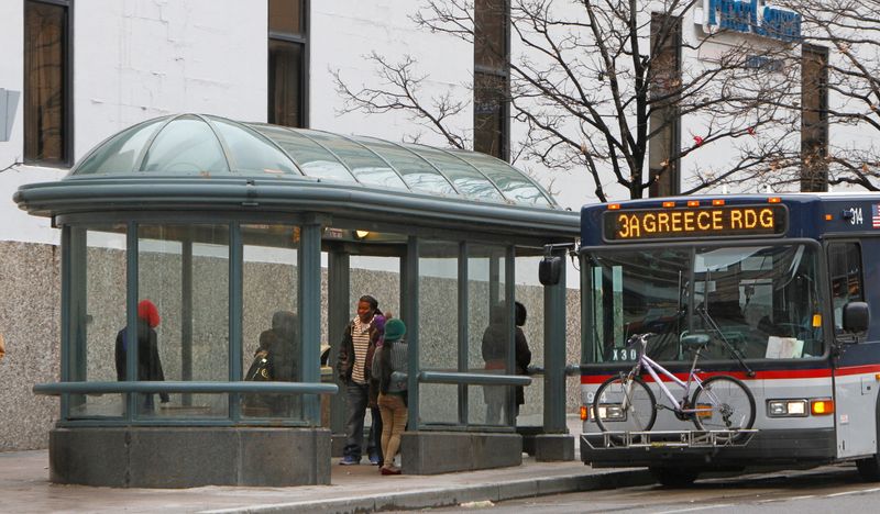 An RTS bus pulls up to the bus shelter on the north side of East Main Street in 2014 in this archive photo.