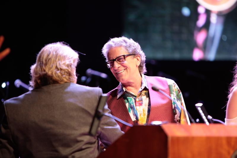 Foreigner frontman Lou Gramm congratulates Gary Lewis of Gary Lewis & the Playboys at the 2017 Rochester Music Hall of Fame induction ceremony.