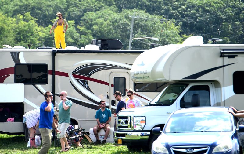 Phish fans break down their camps and prepare to leave Watkins Glen International on Friday, August 17, 2018. The three-day Curveball Festival was cancelled on Thursday night due to water quality issues on the site.