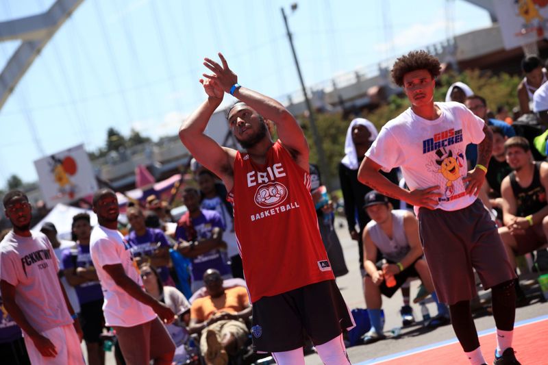 This 2017 file photos shows Richard Sotero of Buffalo watching to see if he made his shot during the Gus Macker Basketball Tournament on Saturday, June 24, 2017.