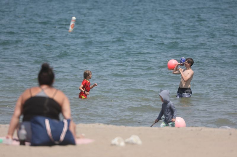 Sodus Point Beach Park and Sodus Bay were busy with beachgoers, boaters and other visitors Friday with temperatures reaching the high 80s.
