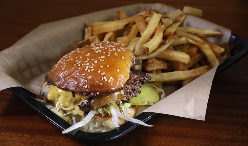 Smash Burger with fries at Public Provisions.