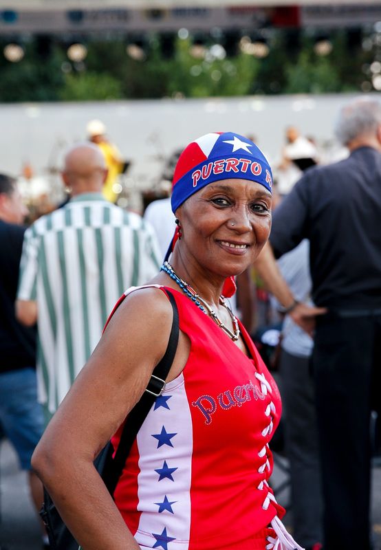 Sonia Medina poses for a portrait at the 52nd annual Puerto Rican festival in Rochester on Aug. 6, 2022.