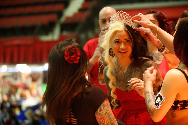 Millz Marly of Willimantic, Conn. is crowned the winner of a tattoo beauty contest at the Westchester Tattoo Convention at the Westchester County Center in White Plains on Oct. 26, 2014.  The event was sponsored by Addicted to Ink of White Plains.