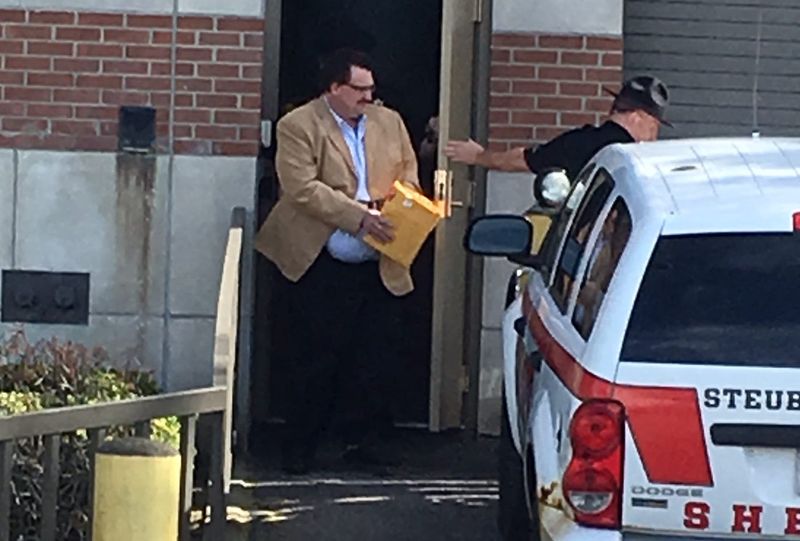 Sheriff's deputies lead Joseph Meyers from the Steuben County Courthouse in this Evening Tribune file photo.