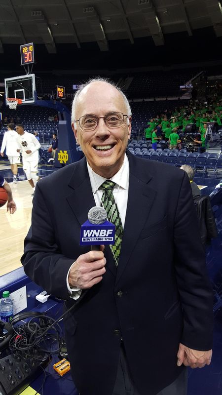 Roger Neel preparing to call a game at Notre Dame.