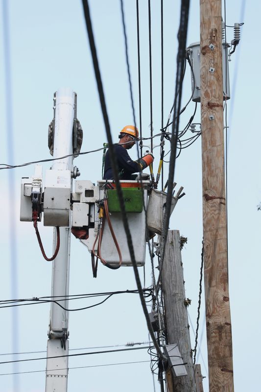 An Orange and Rockland crew repairs wires on Red Schoolhouse Rd. In Chestnut Ridge Aug. 10, 2020.
