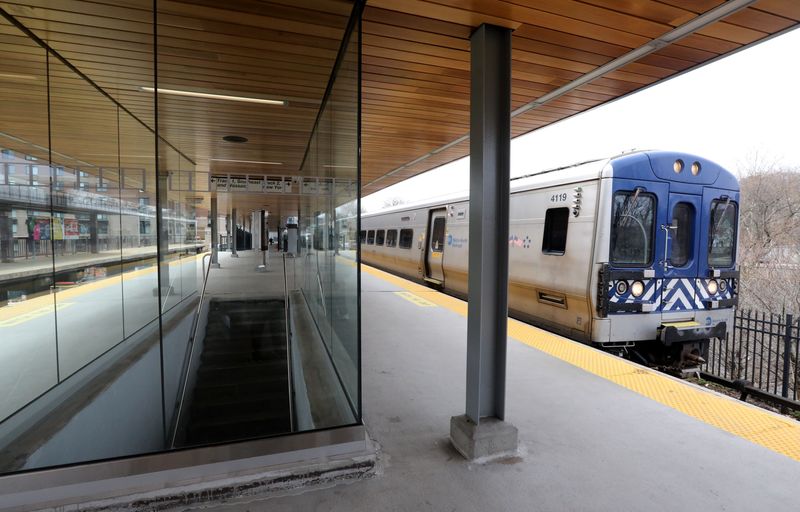 A train pulls into the White Plains Metro-North train station, which has a new look with glass walls, wooden ceilings, exposed beams April 11, 2019.