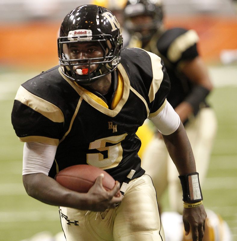 Ashton Broyld runs in a touchdown during the Class AA state championship between the Rush-Henrietta Royal Comets and the Troy Flying Horses at the Carrier Dome on Nov. 28, 2010. R-H won the state title, 40-28. Broyld was named the state Class AA Player of the Year.