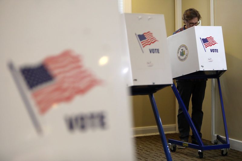 A voter casts his ballot on Election Day at Living Christ Church polling station in South Nyack Nov. 5, 2019.