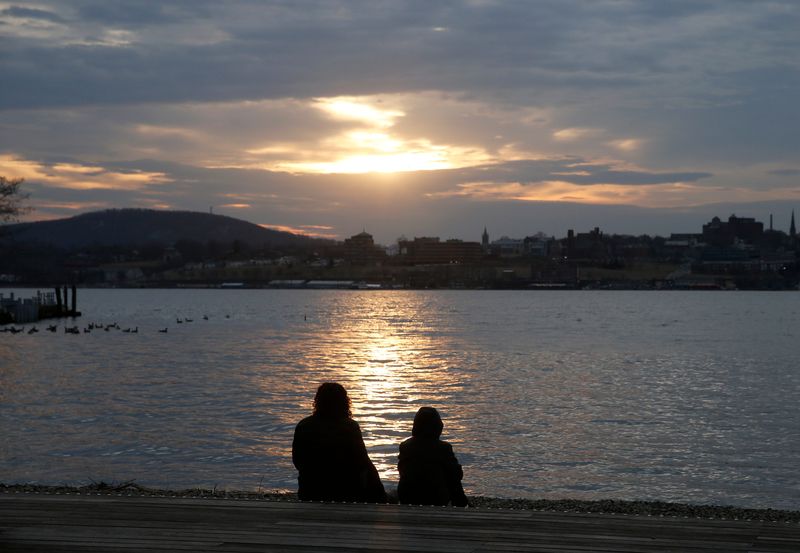 A mother and son enjoy the sunset at Long Dock Park in Beacon on March 2, 2020.