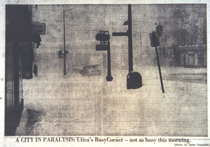 This photo of a busy intersection in Utica, a screenshot from the Jan. 31, 1966 edition of the Observer-Dispatch, shows the streets and sidewalks almost deserted as swirling snow obscures vision during the Blizzard of '66.