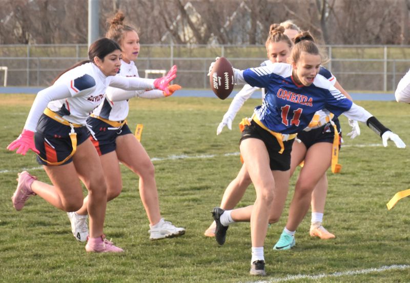 Kaylee French (11) runs with the ball after intercepting a pass against Liverpool during Oneida's inaugural flag football game April 1, 2024, in Oneida. French is among the selections for the first NYSSWA all-state teams.