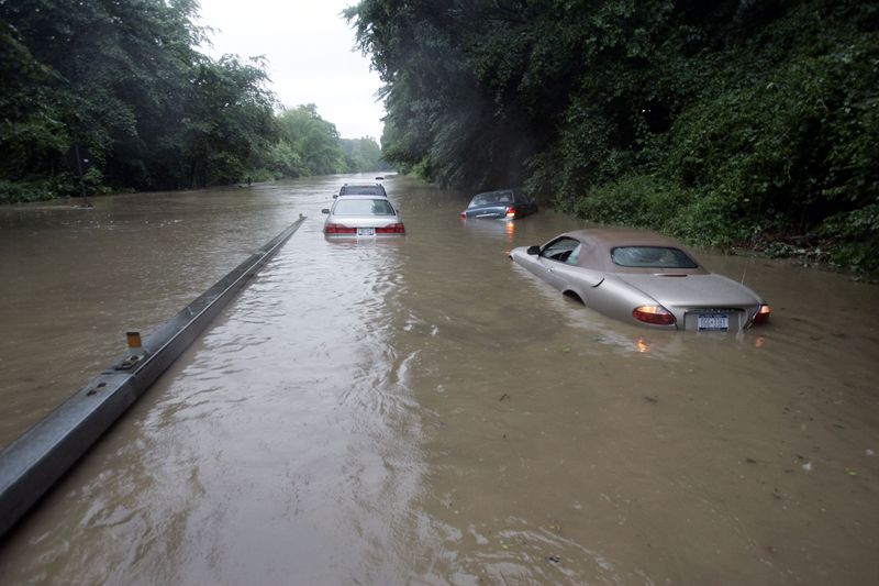 Cars in a flooded section of the Taconic Parkway in Valhalla June 30, 2005. Heavy rains caused flooding in the area.