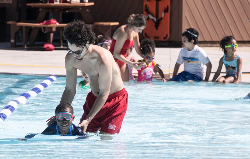 Lifeguard David Tavarez works with Michael Seye, 9, of Yonkers during a Learn to Swim class at Sprain Ridge Pool in Yonkers July 1, 2024. Westchester County offers swim lessons for children and adults at all county pools.