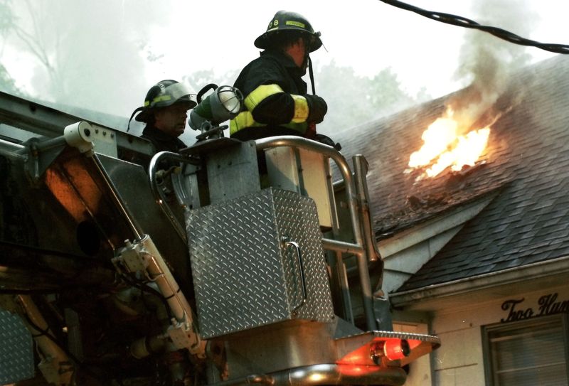 Pleasantville firefighters battle a house fire on Fairview Avenue in Pleasantville July 8, 1994. The.blaze, which was caused by a lightning strike, caused considerable damage to the home.