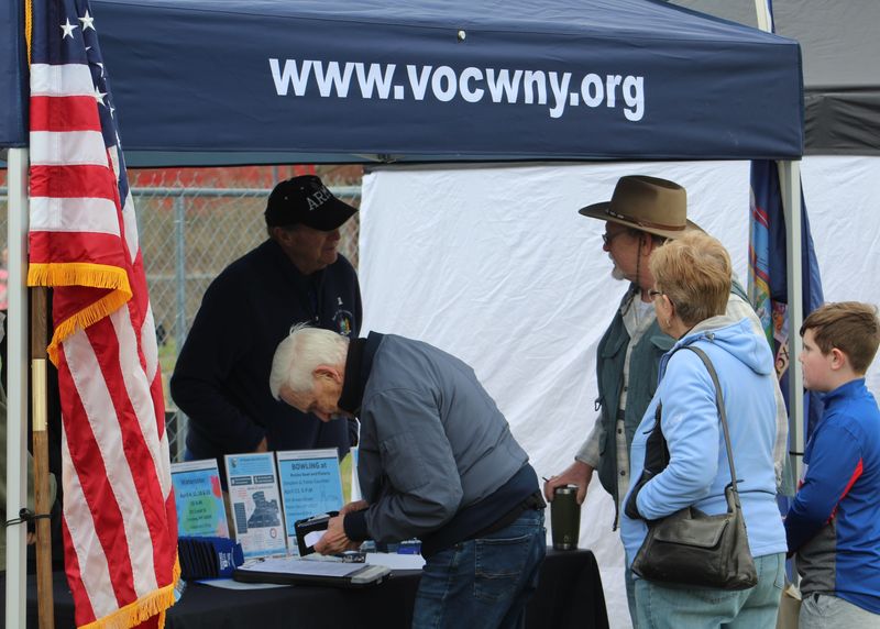 The Veterans One-stop Center had a booth set up at Michael C. Fucci Memorial Park at Shawmut during the solar eclipse viewing event April 8, 2024.