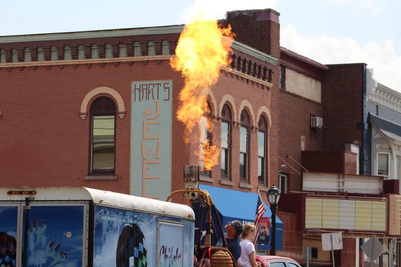 Main Street lights up during the Great Wellsville Balloon Rally Parade Saturday, July 13, 2024. Balloon Rally weekend is set for July 18-20, 2025.