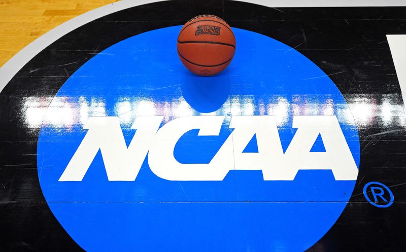 Mar 16, 2018; Charlotte, NC, USA; A view of the NCAA logo and basketball before the game between the Virginia Cavaliers and the UMBC Retrievers in the first round of the 2018 NCAA Tournament at Spectrum Center. Mandatory Credit: Bob Donnan-USA TODAY Sports