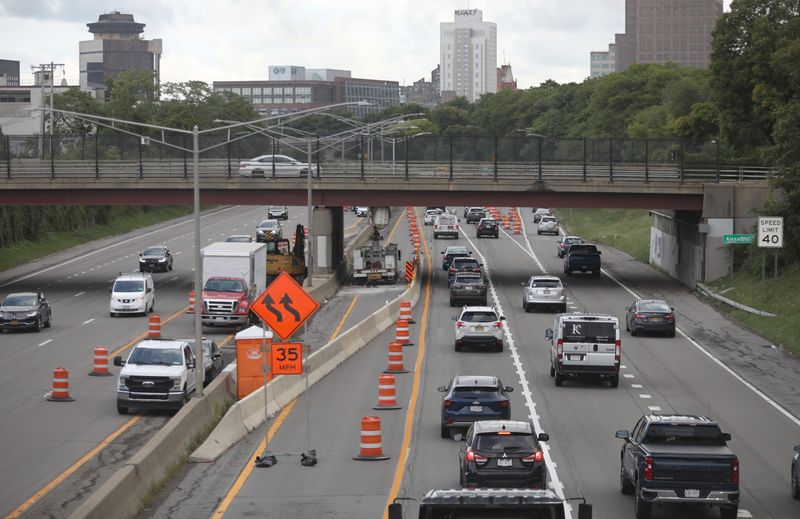 Morning commute traffic slows to a crawl on Interstate 490 west bound into downtown Rochester as lane reductions are in place around the Alexander Street bridge for construction on the bridge, Wednesday, Aug. 21, 2024.