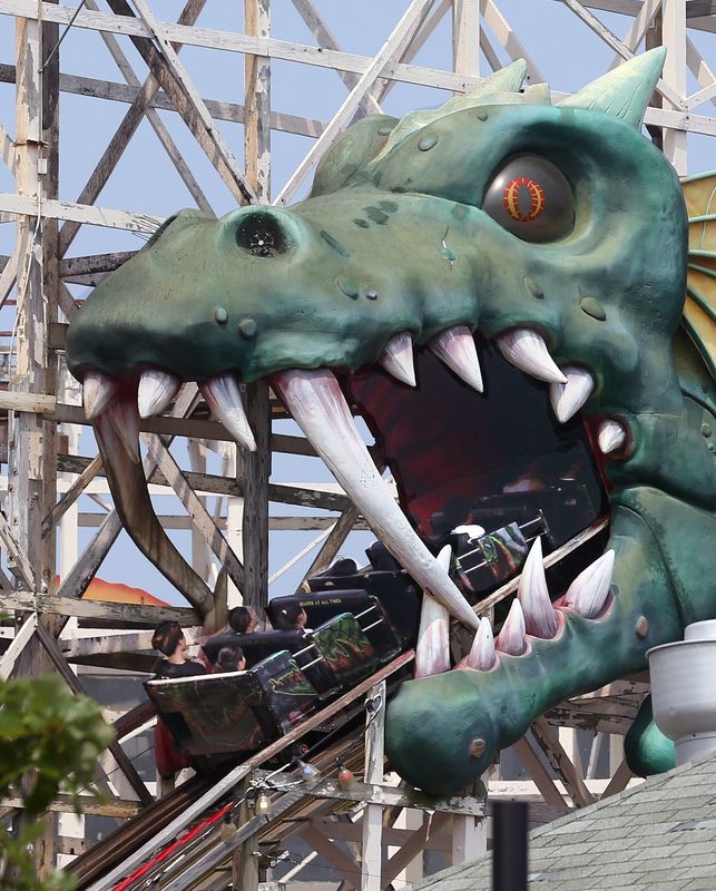 People head into the mouth of the Dragon Coaster at Rye Playland August 24, 2024. Westchester County owns the 280-acre park which is located on Long Island Sound in Rye.