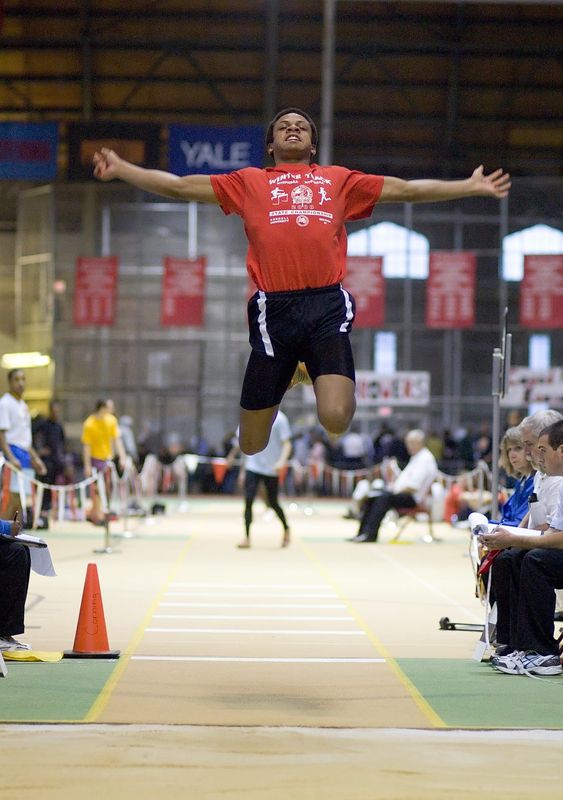 Corning senior Albert (AJ) Johnson jumps in the long jump at the 2008 NYSPHSAA Indoor Track and Field Championships in Ithaca. He placed first in the state for the second year in a row with a jump of 23 feet 6 inches.