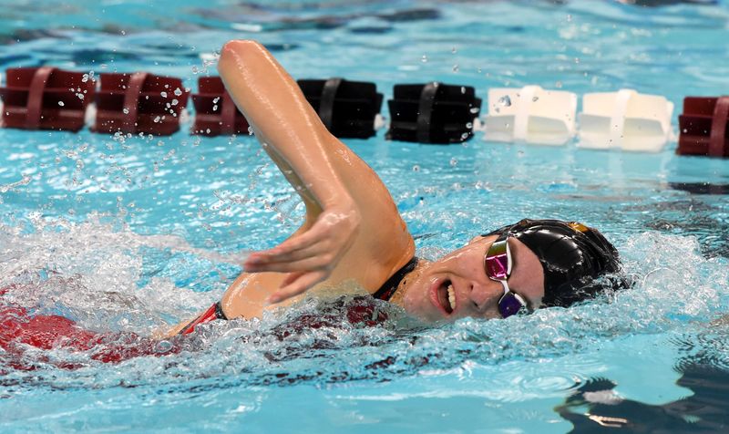 Ithaca's Lea Teschl swims to first place in the 200-yard freestyle at the Elmira Express Girls Swimming & Diving Invitational on Oct. 12, 2024 at Ernie Davis Academy's Thomas Natatorium.