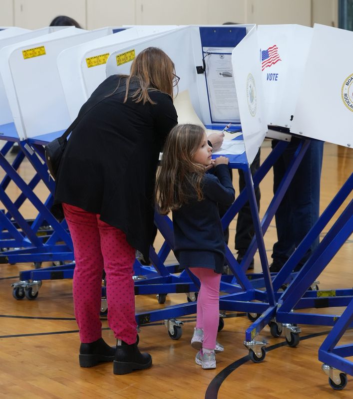 Danielle Anderson of Blauvelt votes with her daughter, Cassidy, 5, at St. Catharine's Church in Blauvelt Nov. 5, 2024.