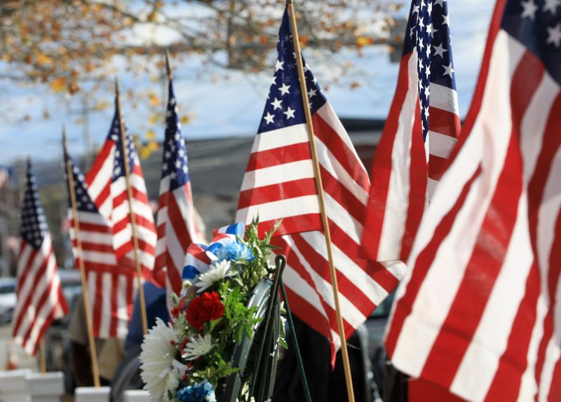 Flags adorn the Dutchess County War Memorial for the Veteran's Day ceremony on November 11, 2024.