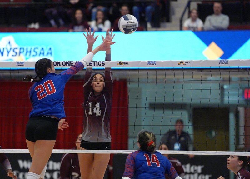 Blind Brook's Ella Rosenfeld (20) puts a shot past Valhalla's Kristen Mendez (14) during their 3-0 win in the Section 1 Class B girls volleyball championship match at the Westchester County Center in White Plains on Saturday, November 9, 2024.