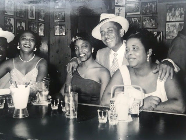 Patrons at The Pythodd Room, a popular 20th century jazz club in Rochester.