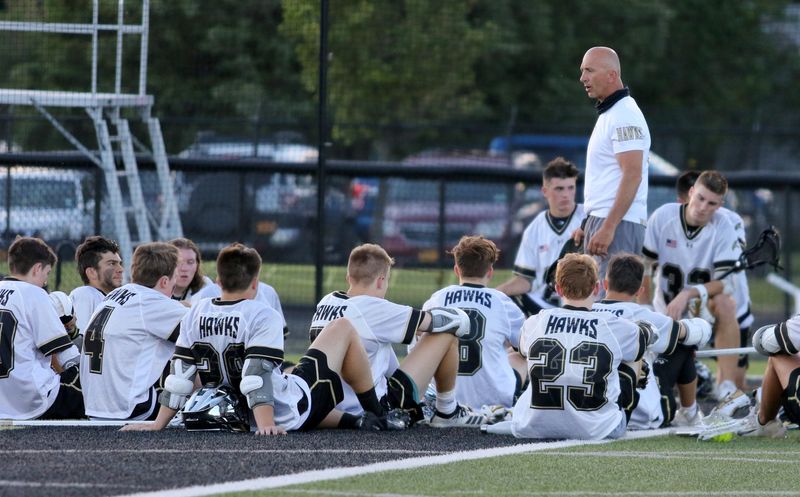 Chris Hogue talks to his players during a 14-9 win over Ithaca in the Section 4 Class A boys lacrosse championship game June 14, 2021 at Corning Memorial Stadium.