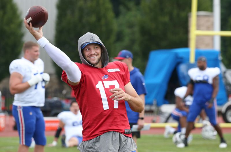 Bills quarterback Josh Allen warms up on the sidelines during the Buffalo Bills training camp Monday, Sept. 5, 2024 at St. John Fisher University.