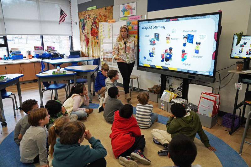 Instructor Marina Pisto presents students with the task to build a classroom during the “Lego Build the Challenge” Extended Learning Opportunities (ELO) afterschool program at Pocantico Hills Central School Jan. 13, 2025 in Sleepy Hollow. The program offers a variety of topics that include STEM, cooking and visual arts.