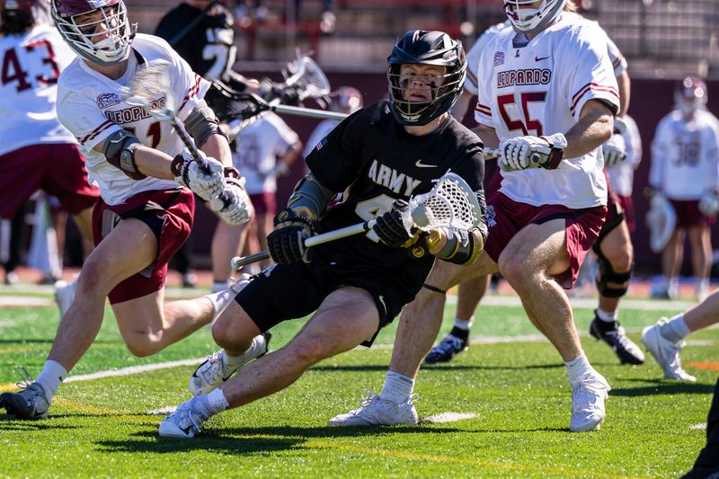 Evan Plunkett (4) '26, from Roswell, Ga., is a junior midfielder for Army men's lacrosse.