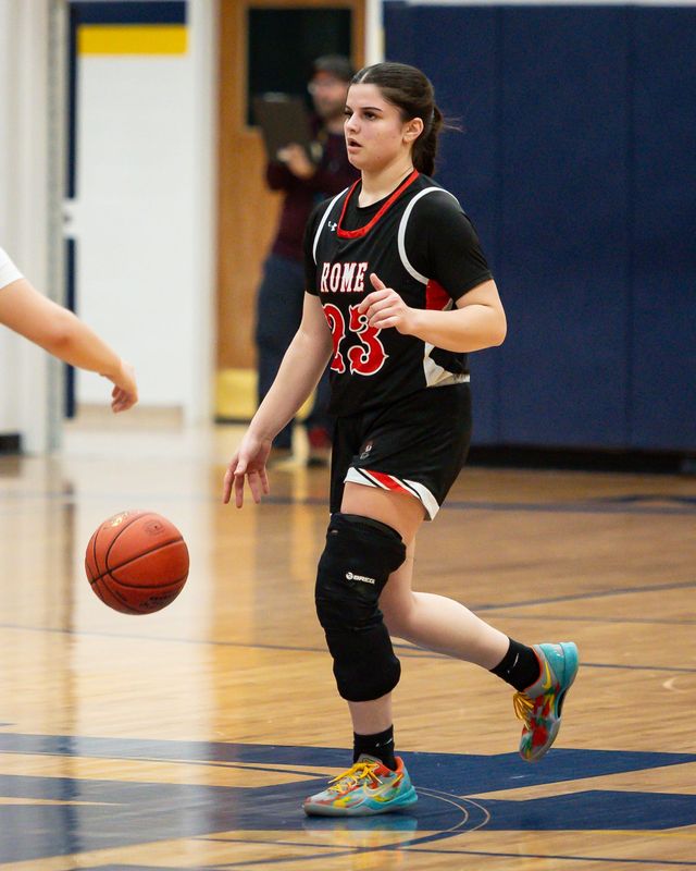 Rome Free Academy Black Knight Haylee Bostwick dribbles the ball during a January game at Notre Dame. She started her senior season with a double-double against Proctor and was selected by onling readers of the Times Telegtram and Observer-Dospatch as their first Athlete of the Week of the winter athletic season.