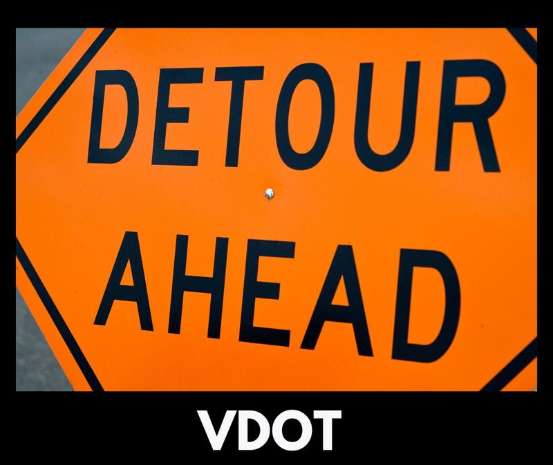 A detour ahead sign.