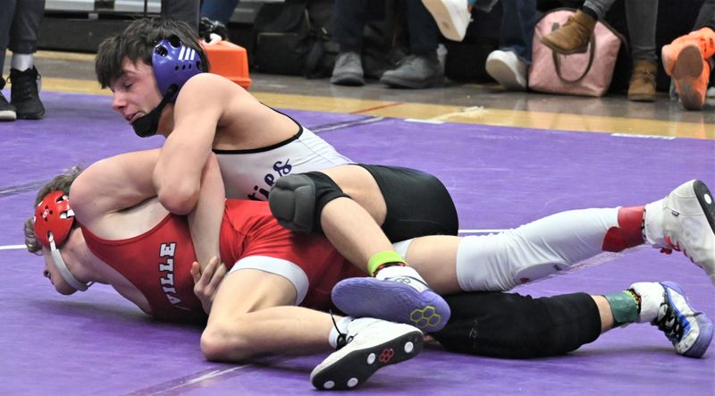Little Falls Mountie Nate Verri (top) battles Lowville Academy's Caleb Farney during their title bout at Section III's 2025 Class D individual tournament in Little Falls. Verri and the Mounties finished second at Section III's Division II dual meet tournament last year and enter this year's tournament as the No. 2 seed.