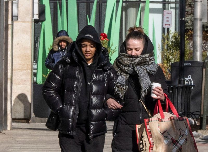 Pedestrians brace themselves against the cold and wind in downtown White Plains Feb. 17, 2025. A wind advisory remains in effect until 6:00 pm Monday.