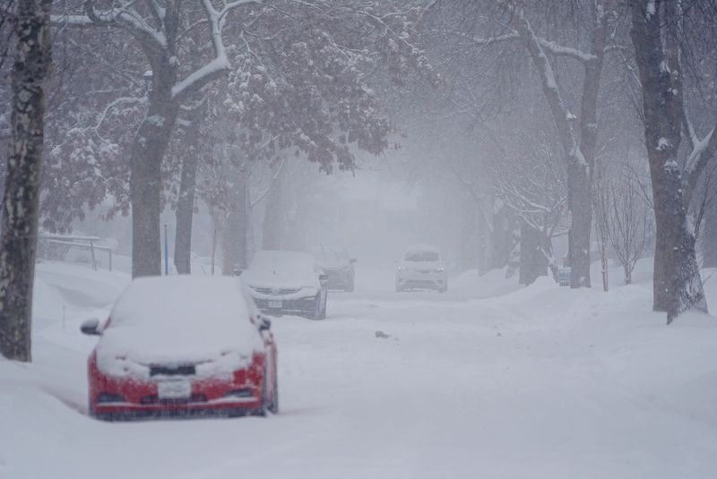 Many streets like West High Terrace in Rochester were still snow covered by mid morning on February. 17, 2025.